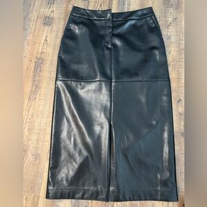 Charlie B faux leather black long skirt with front slit size 6